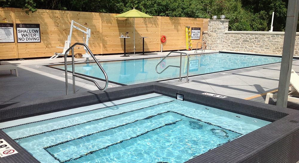 Elevated outdoor leisure pool and spa at Elora Mill Hotel & Spa in Eloria, Ontario